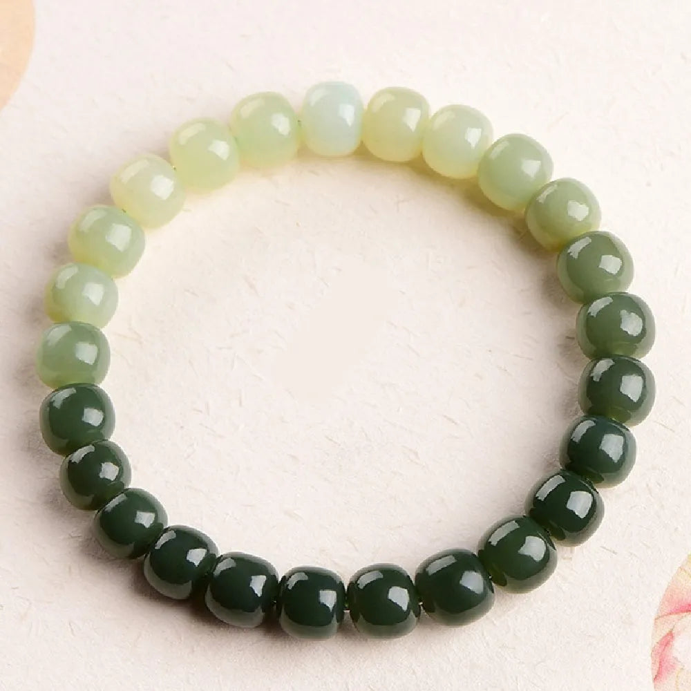 Natural Hetian jade bracelet with water gradient colour and polished beads