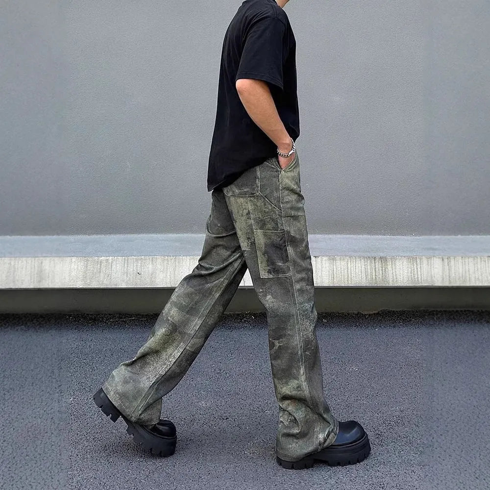 Men's straight leg jeans in a retro digital camouflage pattern on blue denim