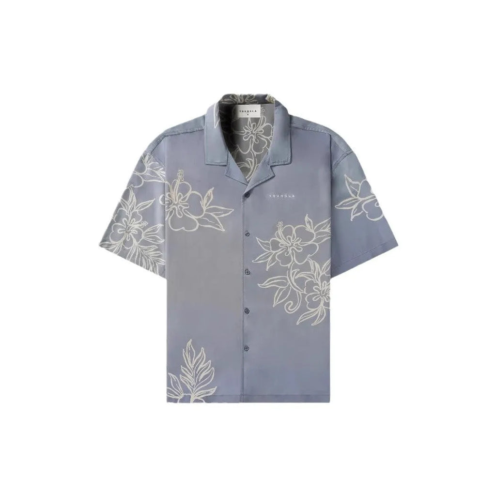 A man's loose grey short-sleeved cardigan with a floral print, showing the elastic band fabric.