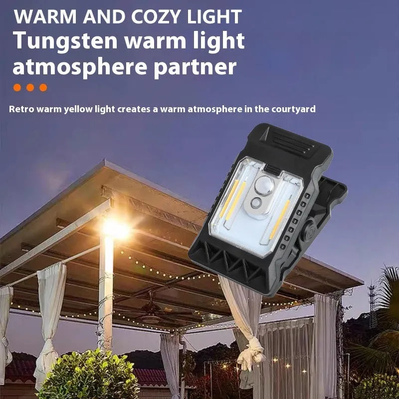 Black intelligent induction clip lamp with flexible gooseneck, shown clipped to a shelf.