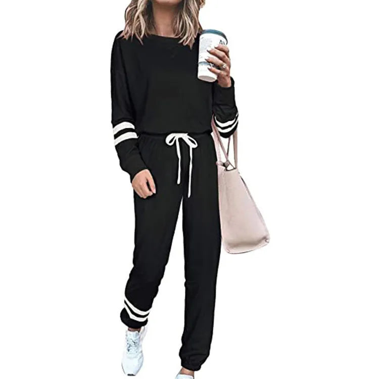 Women's plus size casual suit set with loose-fitting long sleeve top and trousers in solid colour