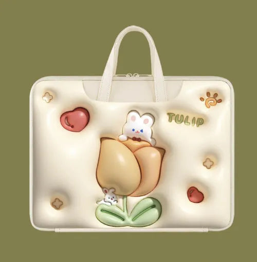 PU leather inflatable laptop bag with cartoon print, shown hanging from a suitcase handle.
