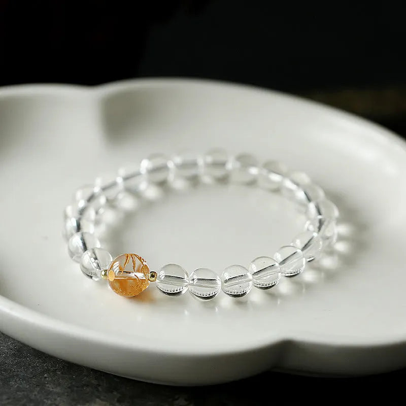 Geometric unisex bracelet with obsidian, black agate, and white crystal beads and dragon charm