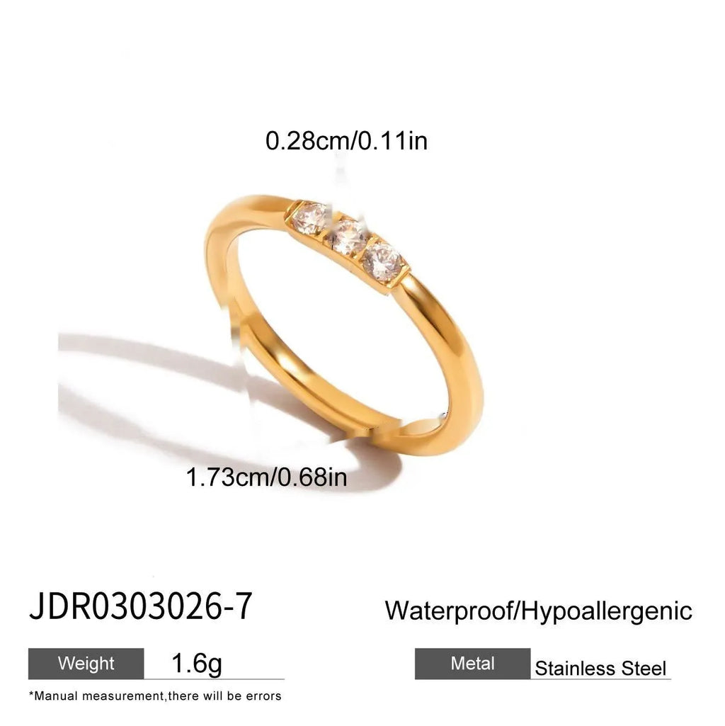 Geometric titanium steel ring with zircon stones in a silver-tone finish.