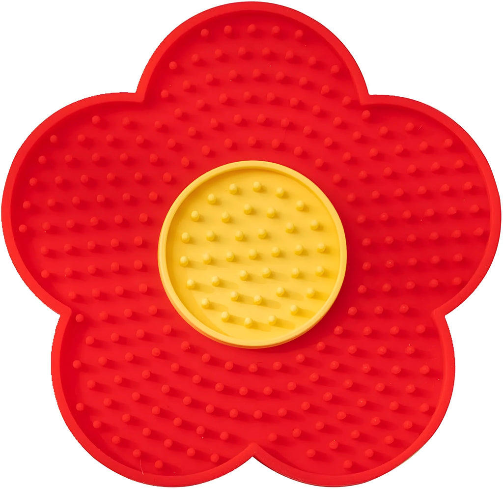 Flower-shaped silicone pet lick pad with suction cup base in assorted colours.