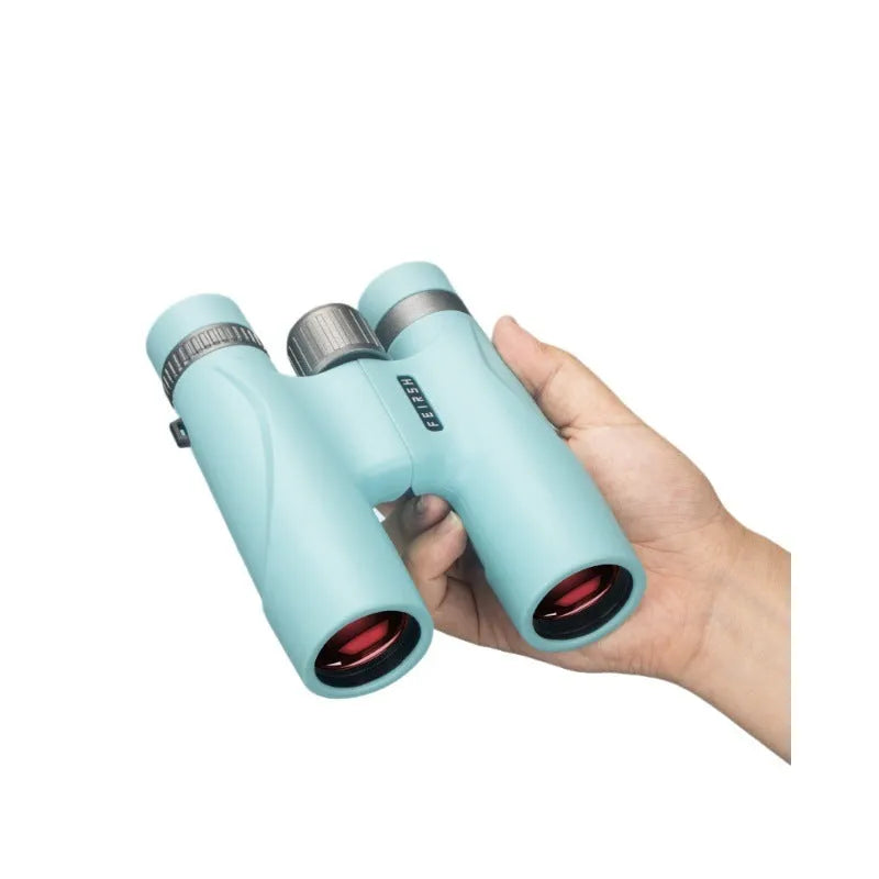 Blue and grey 10x32 compact binoculars with wine red film imaging on a table.