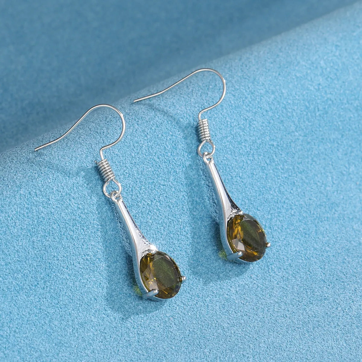 Olive green topaz drop-shaped earrings with retro design on alloy with electroplated finish