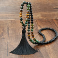 Long handmade Bohemian necklace with a natural stone tassel and mixed gem geometric pendant on an 81cm chain.
