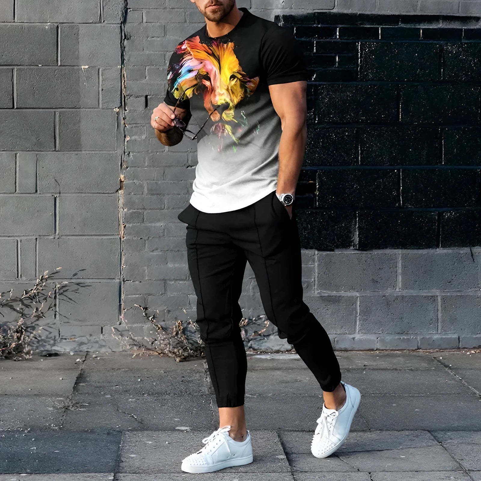 Men's short-sleeve polyester suit set showing T-shirt and trousers in printed colours