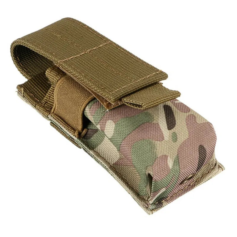 Black 600D nylon MOLLE tactical pouch with elastic cord closure, shown next to a small flashlight for scale.
