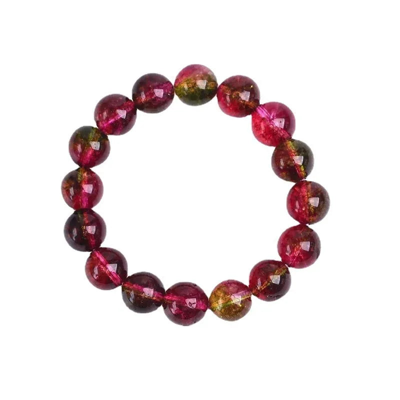 Handmade watermelon crystal bracelet showing pastoral design details on a wrist.