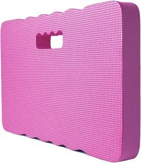 Solid blue EVA foam garden kneeler pad on soil for comfortable planting and weeding.