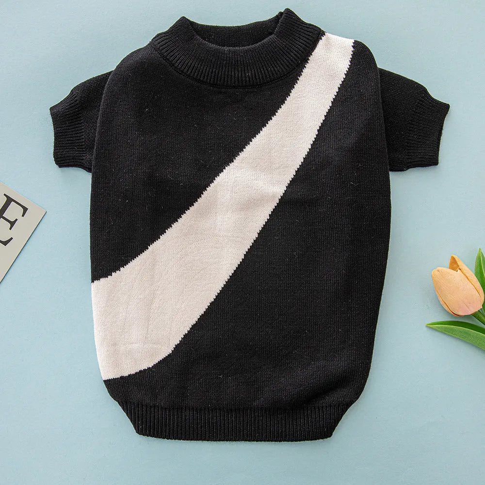 A small dog wearing a casual wool jumper in one of six available colours: black, orange red, pink, milky white, light green, or sapphire blue.