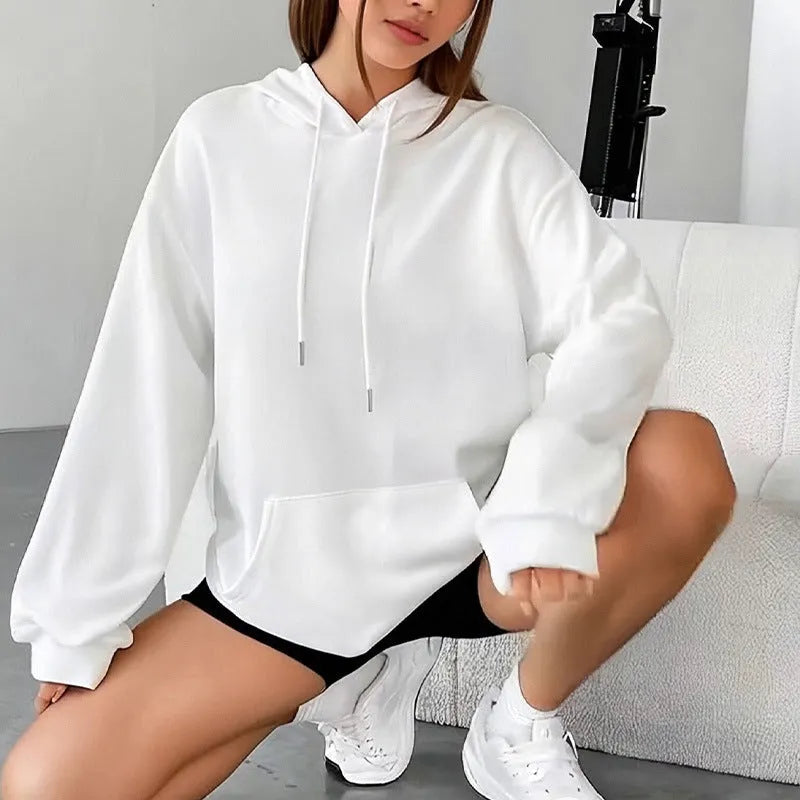 Women's loose grey sweatshirt with drawstring pockets and long sleeves