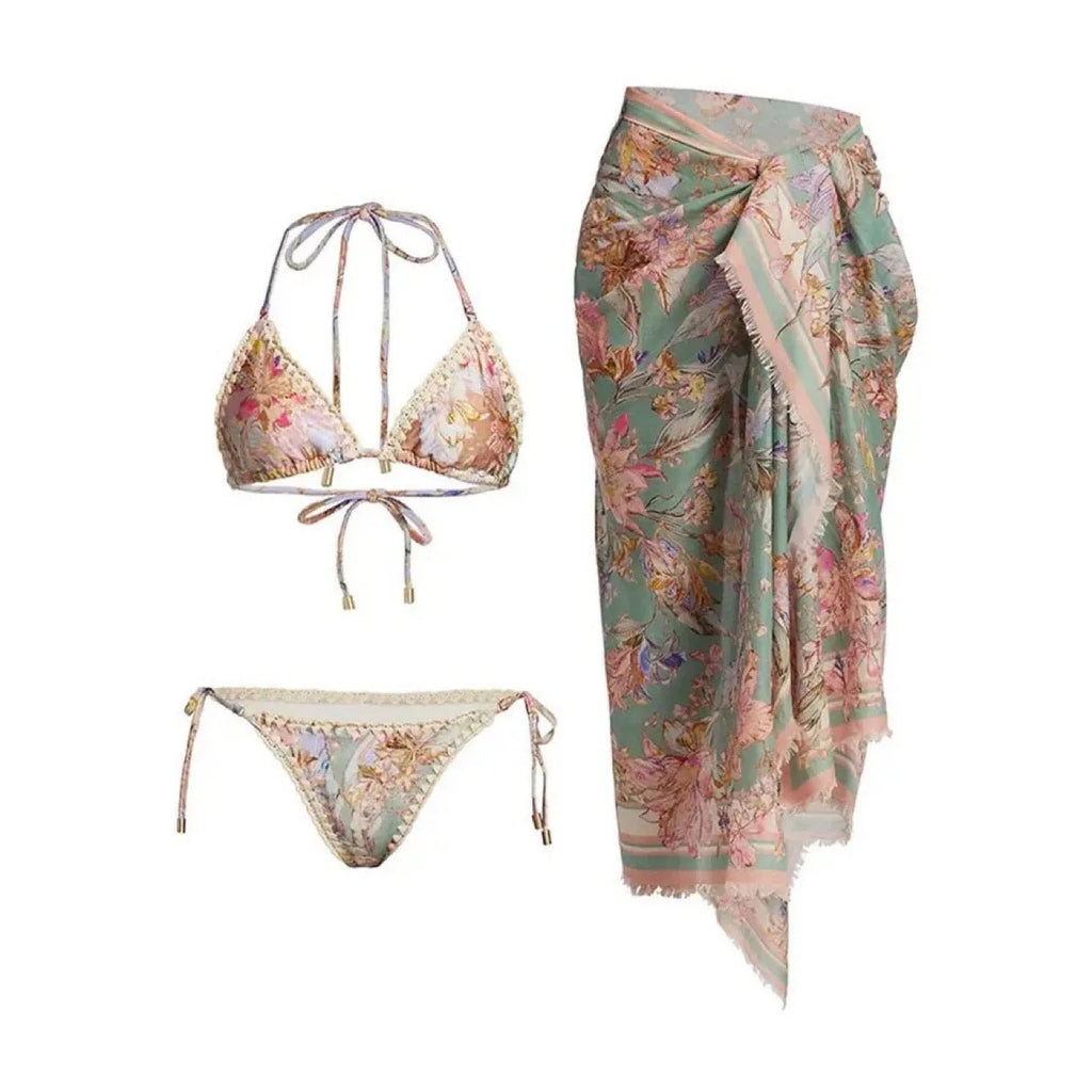 Women's creamy white floral print bikini set with top, briefs, and detachable skirt