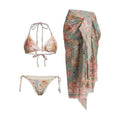 Women's creamy white floral print bikini set with top, briefs, and detachable skirt