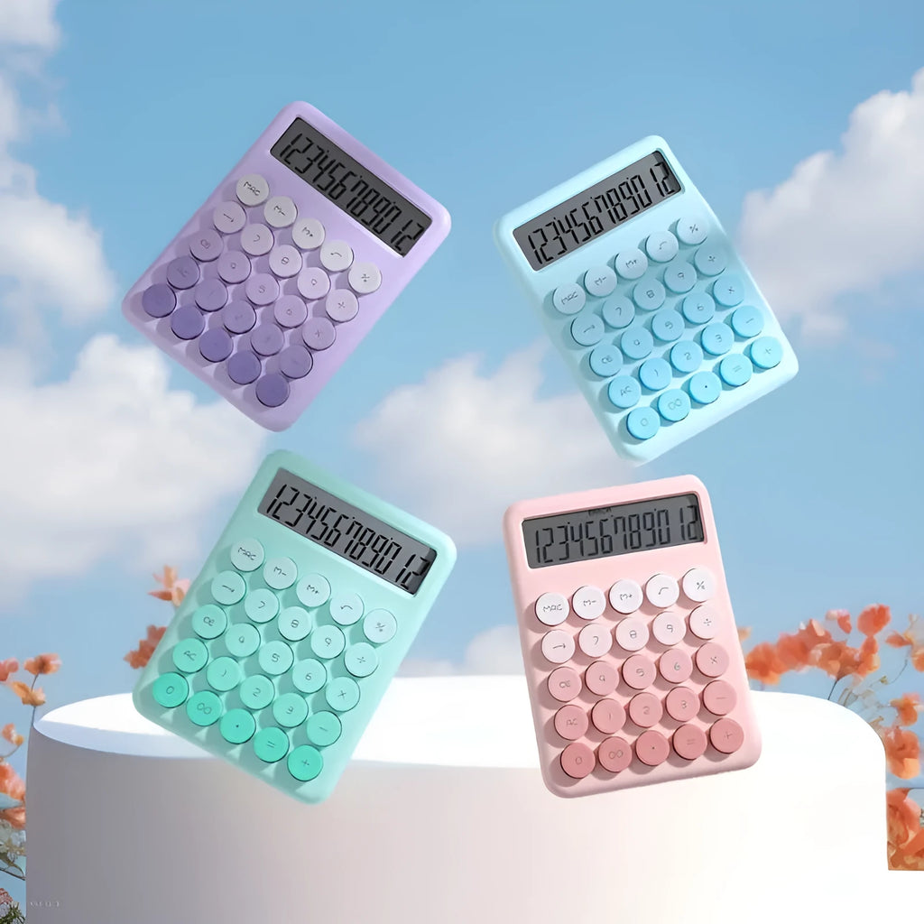 Gradient colour desk calculator in violet, cherry blossom pink, blue, or mint green on a desk.