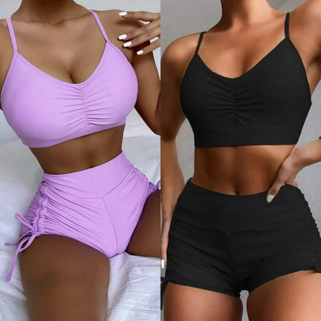 Purple women's high waisted bikini swimsuit with split side shorts and matching top