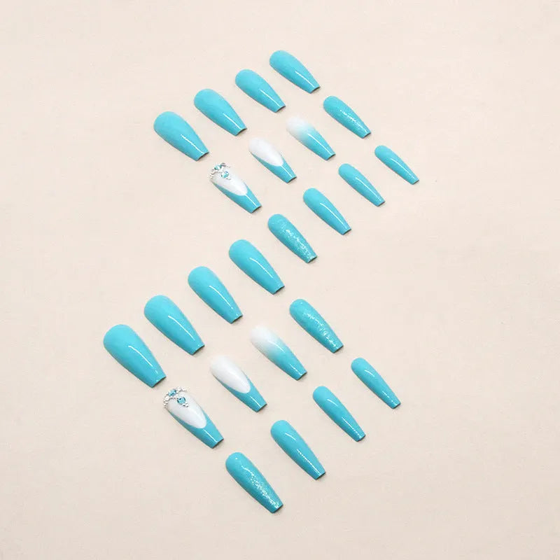 Long ballet false nails with blue diamond glitter debris effect