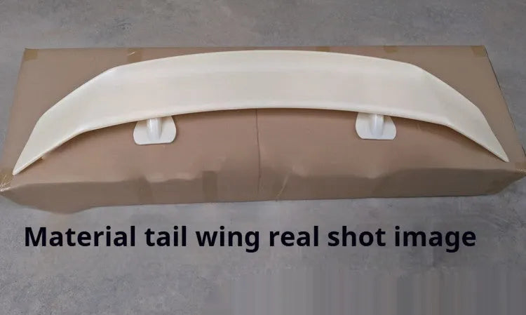 Universal punch-free car spoiler made from ABS plastic, shown in bright black finish.