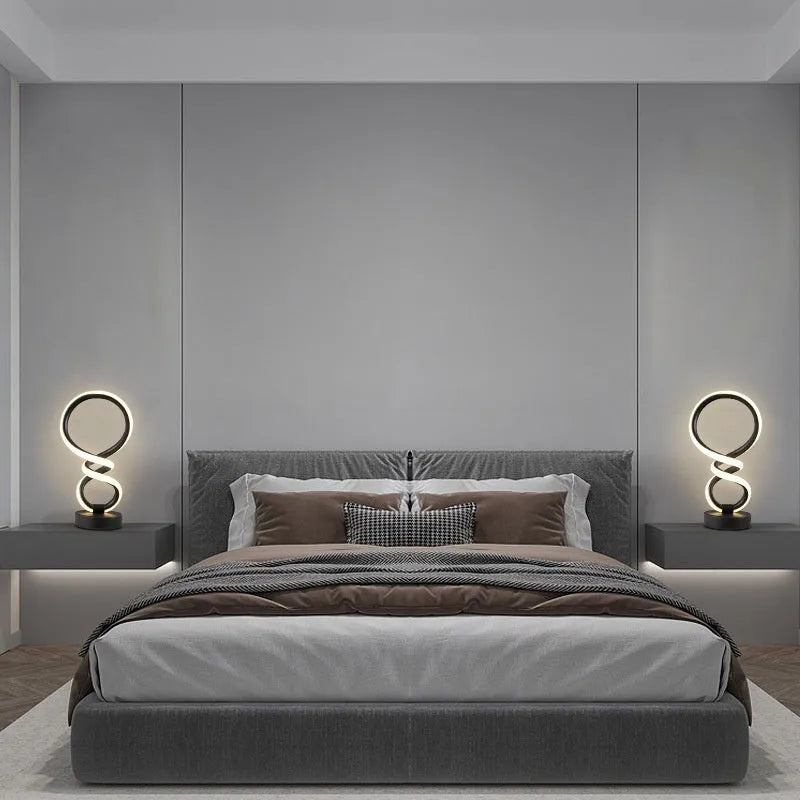Black musical note-shaped Bluetooth LED light with app remote control on a bedside table.