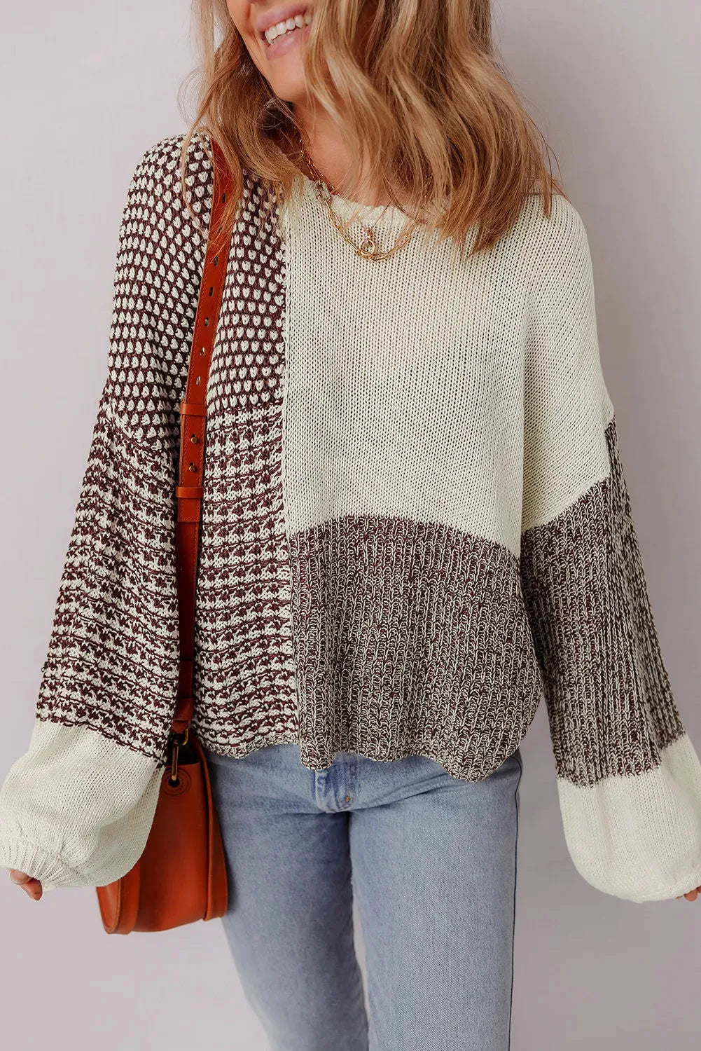 Dark khaki loose drop shoulder sweater with colour block panels and a back tie detail.