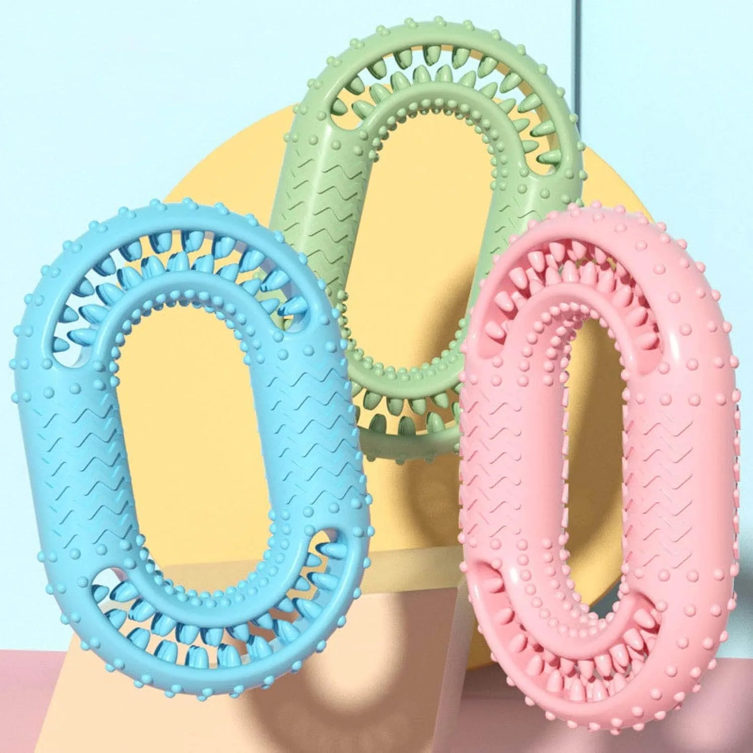 O-ring shaped dog chew toy for aggressive chewers in blue, green and pink colour options