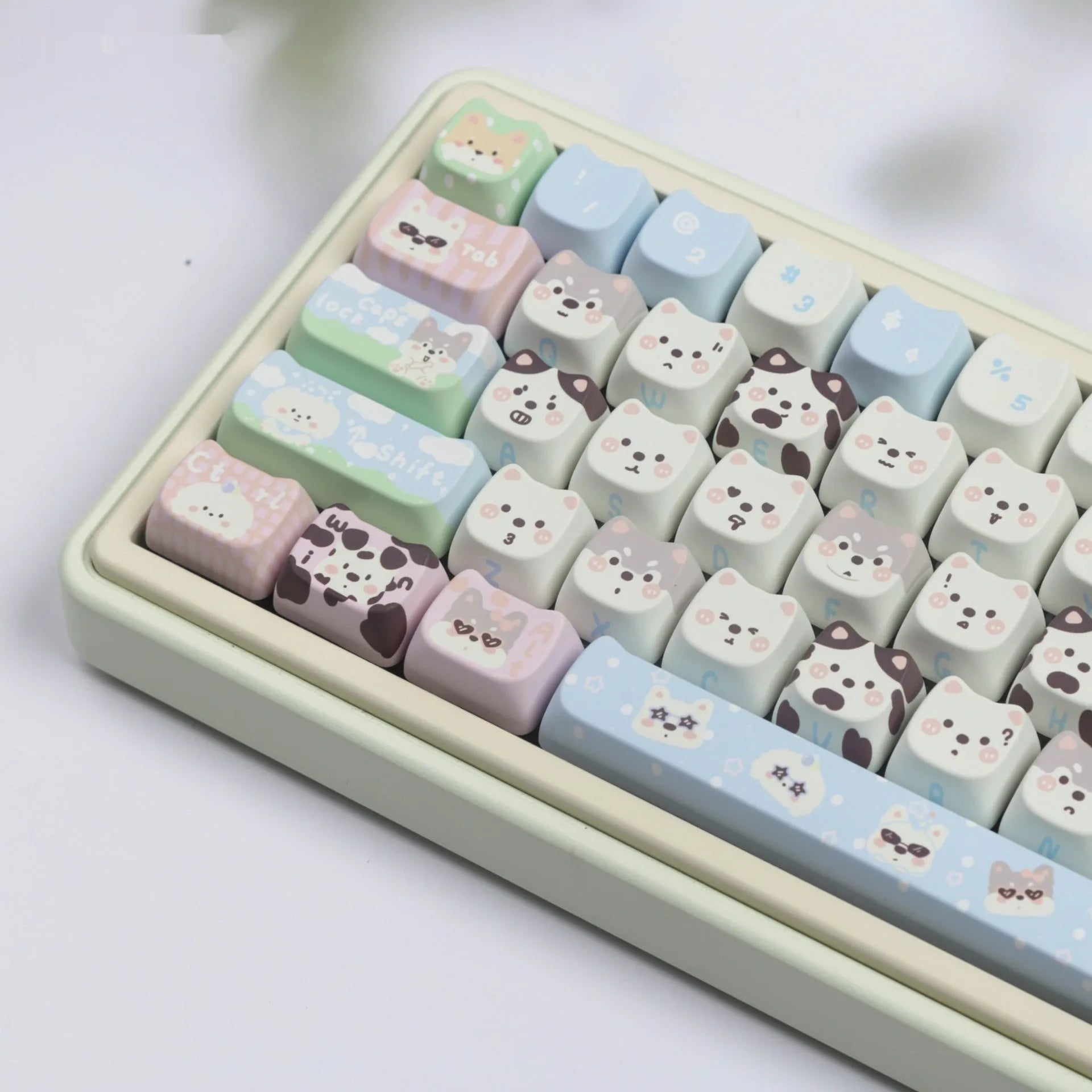 PBT sublimation key cap set showing colourful puppy and cat artwork on mechanical keyboard keys