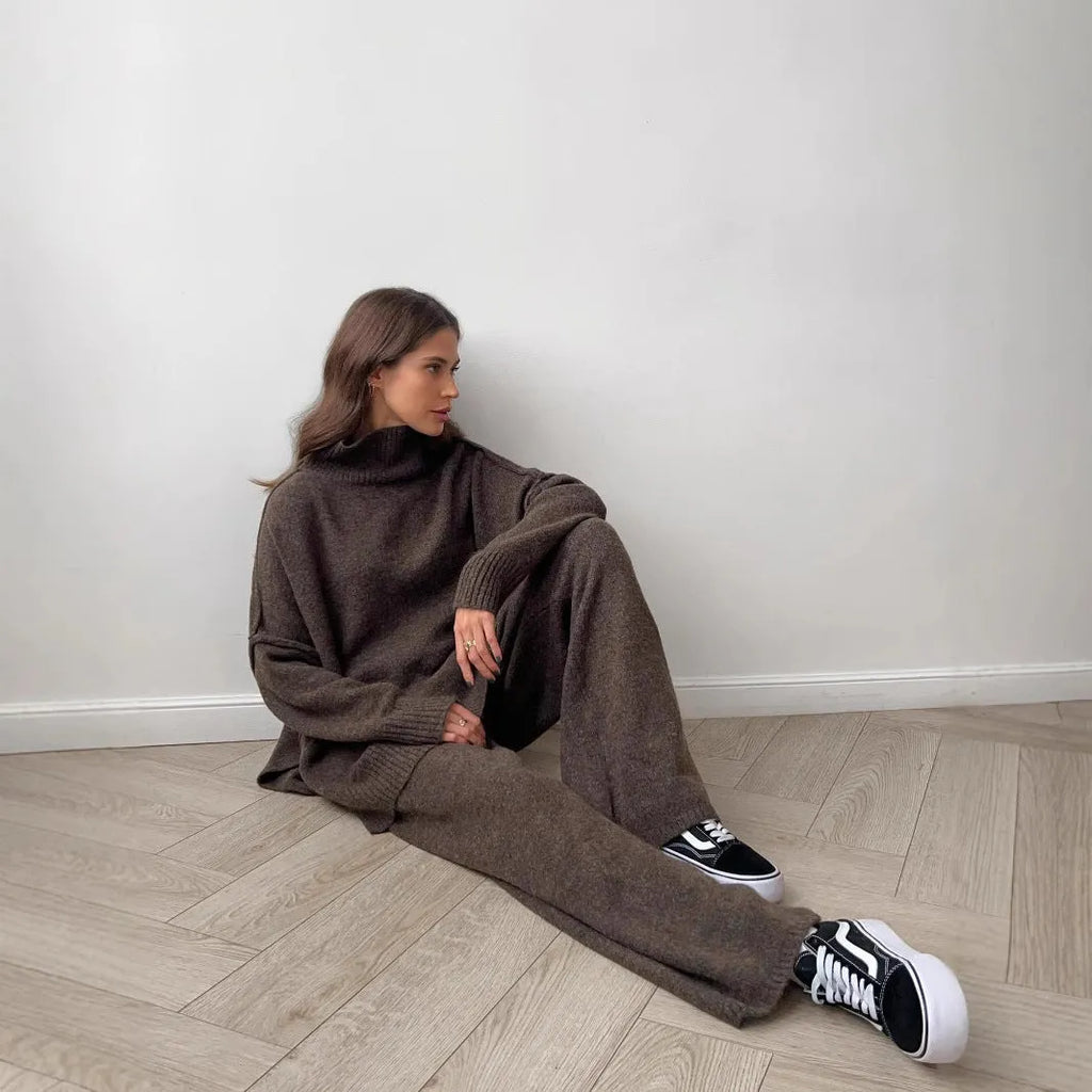 Women's acrylic suit set with side-slit sweater and matching trousers in solid colour
