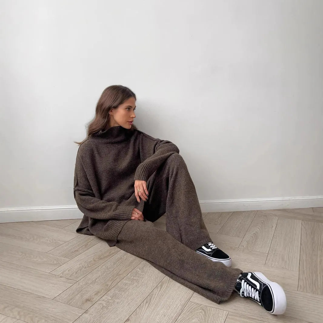 Women's acrylic suit set with side-slit sweater and matching trousers in solid colour