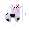 Plush green parrot-shaped cat toy with catnip, shown next to cow and crocodile versions.