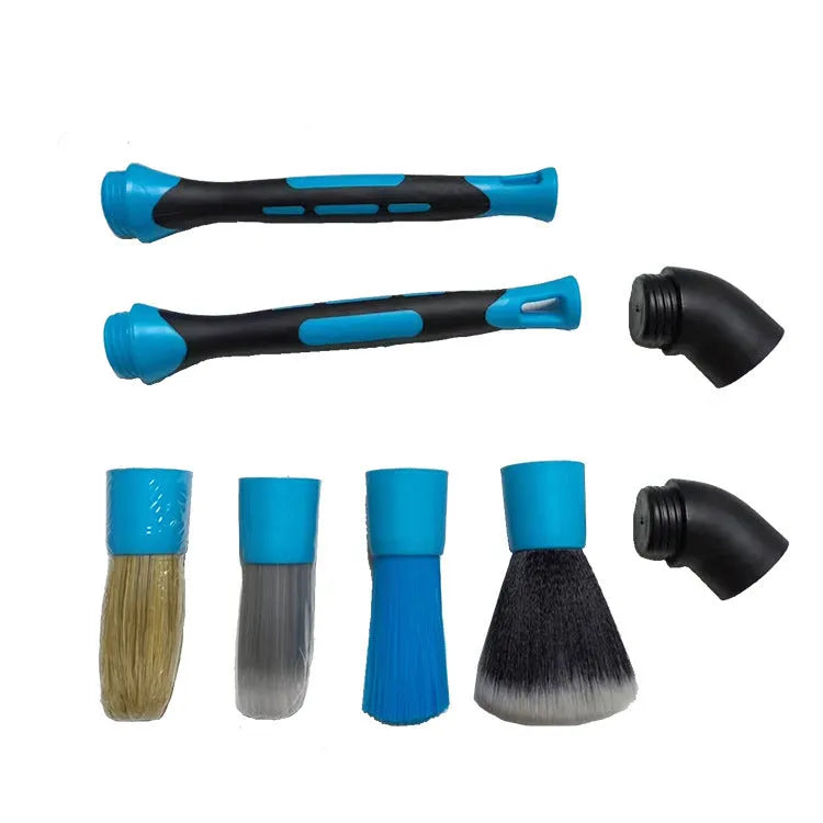 Blue detachable car wash brush set with 4 brush heads, 2 handles, and 2 elbow connectors on a workspace