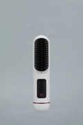 Portable negative ion hair comb in blue, grey, or white, showing its 15-20cm ABS plastic body.