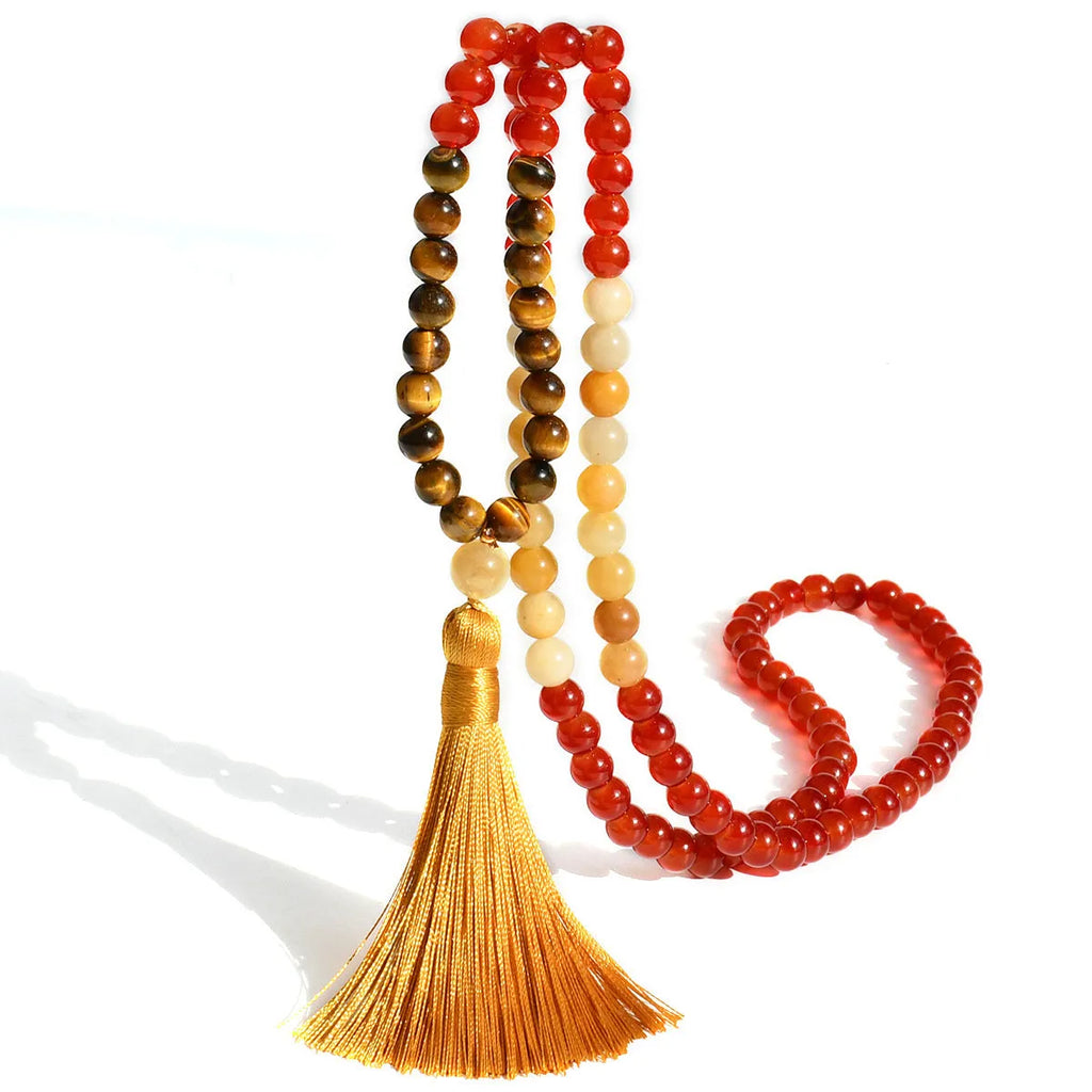 Long handmade Bohemian necklace with a natural stone tassel and mixed gem geometric pendant on an 81cm chain.