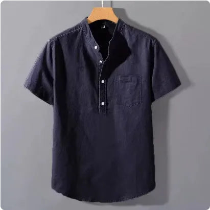 Men's loose-fit solid colour linen shirt with a stand collar and short sleeves on a hanger.