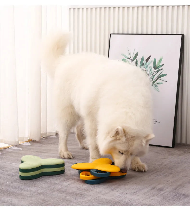 Green dog puzzle toy with bone-shaped lids and non-slip base for treat dispensing