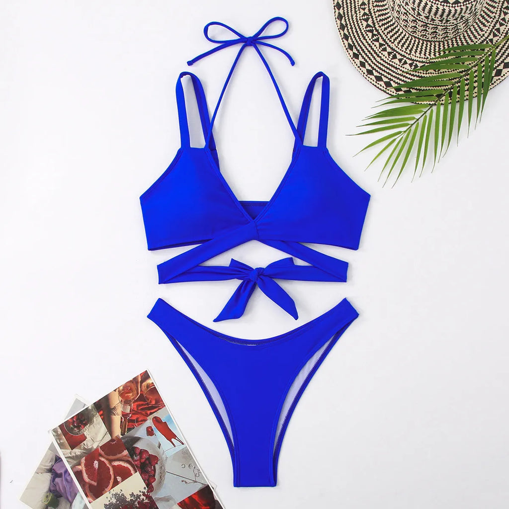Solid colour strap bikini swimsuit for women in black, shown on a mannequin, sleeveless design with briefs.