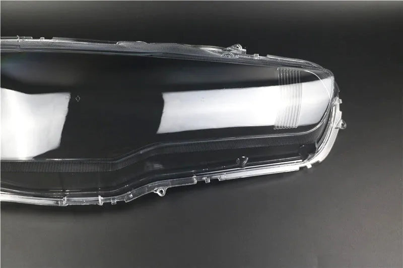 Transparent plastic headlight housing covers for main driver and co-pilot vehicle lamps