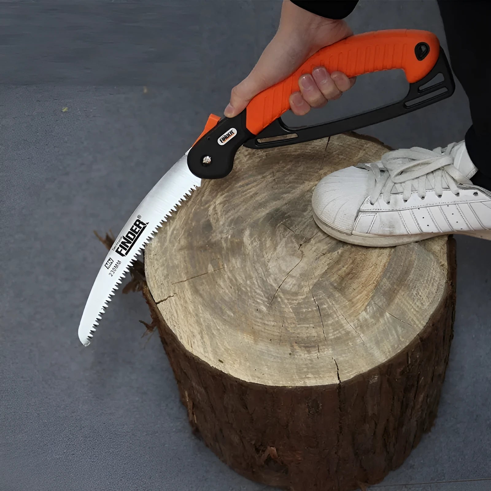 Folding garden saw with 230mm blade shown both open for use and closed for carrying