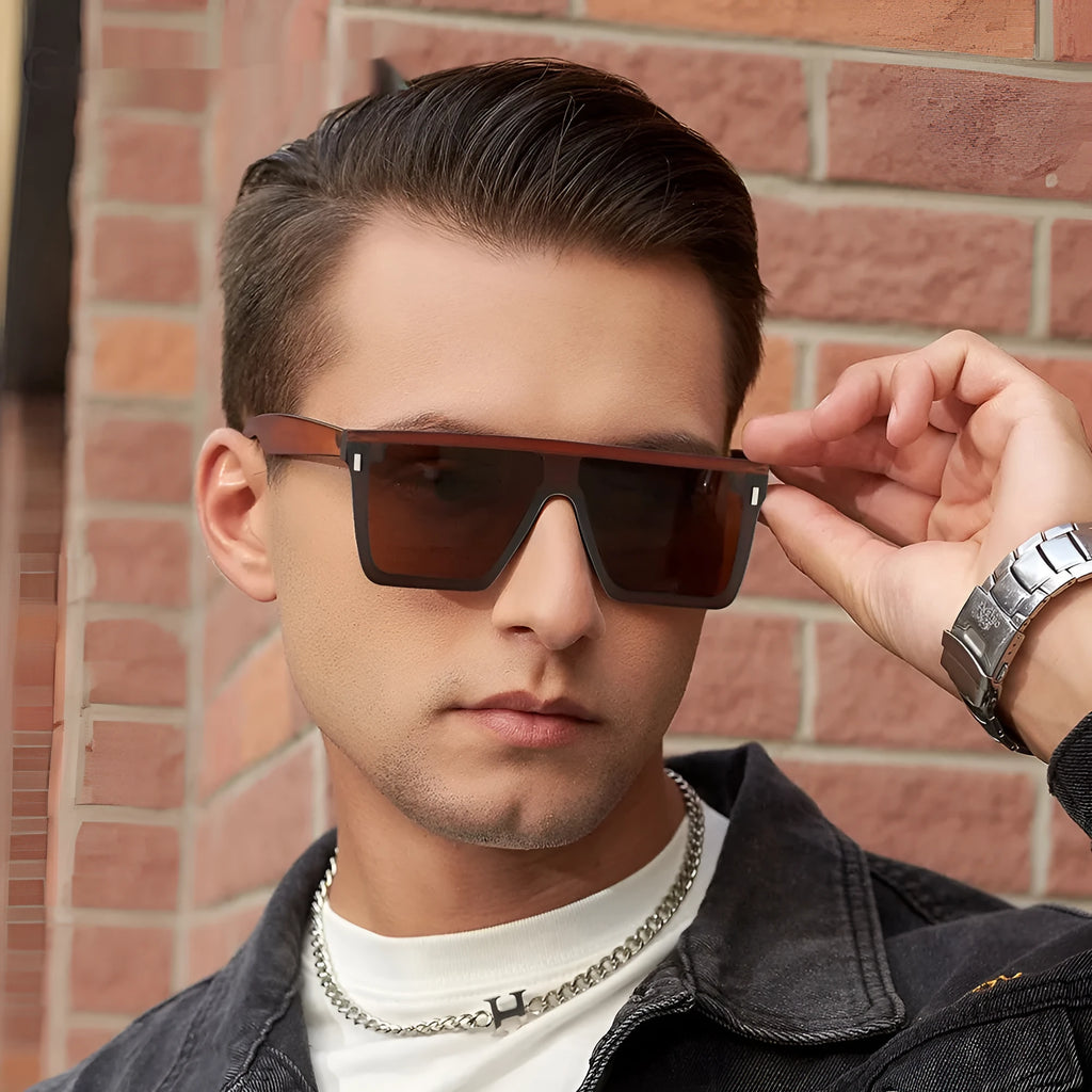 Polarised sunglasses with TAC lens and UV400 protection in sand black frame colour.