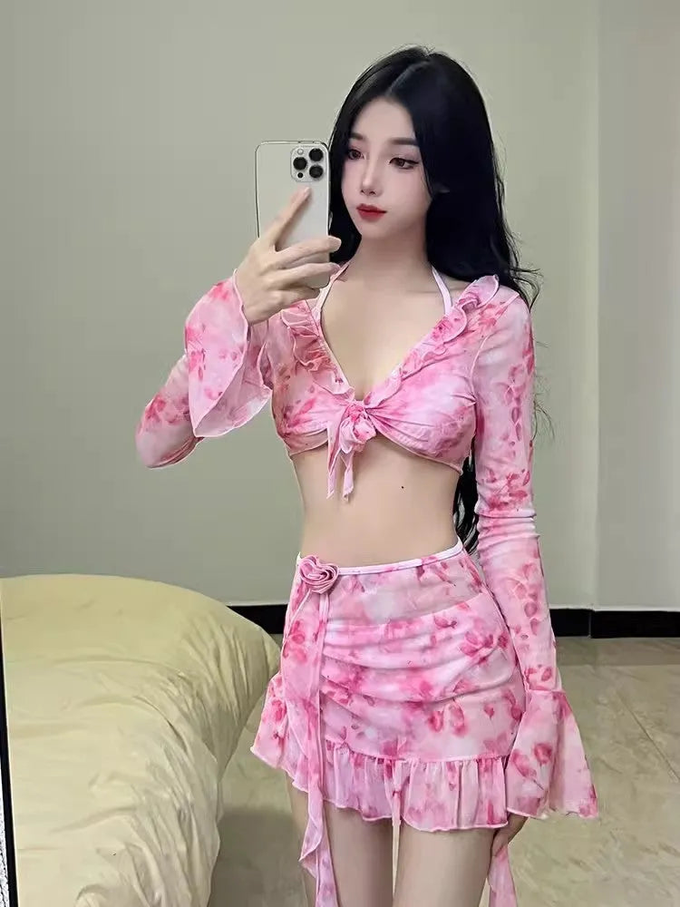 Women's floral bikini swimsuit in cherry blossom colours for beach and hot spring use