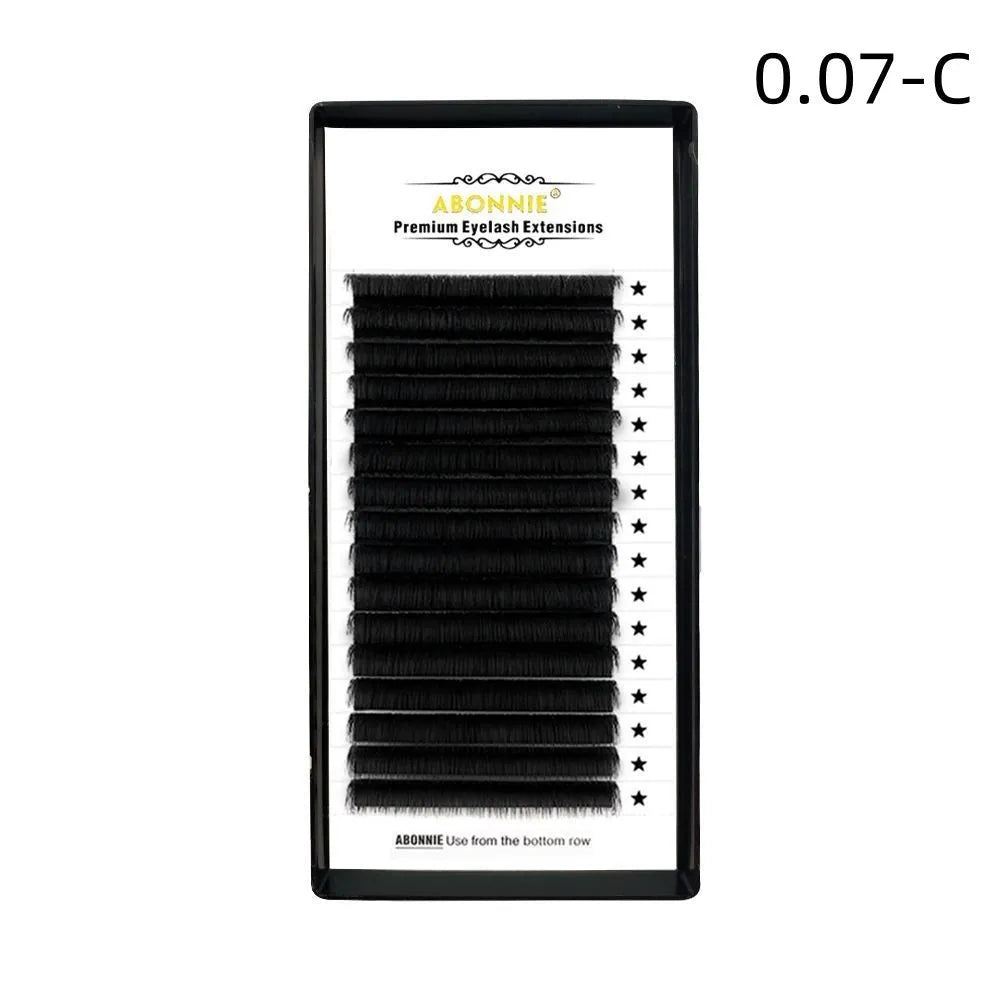 Pack of matte mink hair false eyelashes showing dense 16-row strip on a clear background.