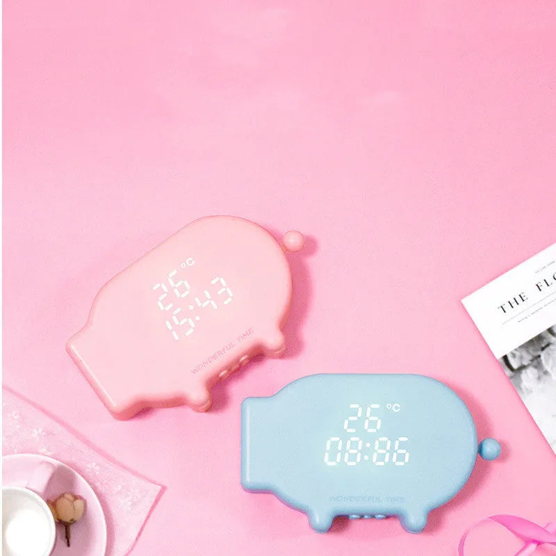 Blue or pink LED alarm clock with digital temperature display and USB charging port