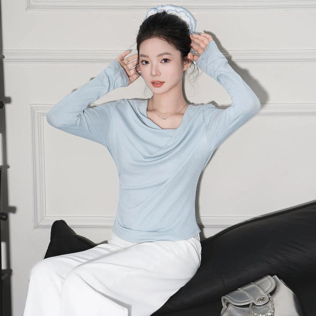Off-shoulder cashmere long-sleeve top in light pink with pleated detail and slim fit