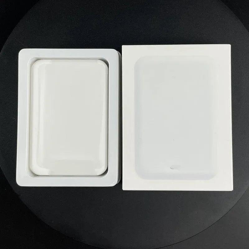 White magnetic wireless charging power bank showing compact size and creative design.