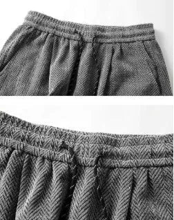 Plus size straight-leg trousers in black with elastic waistband and fleece-lined construction