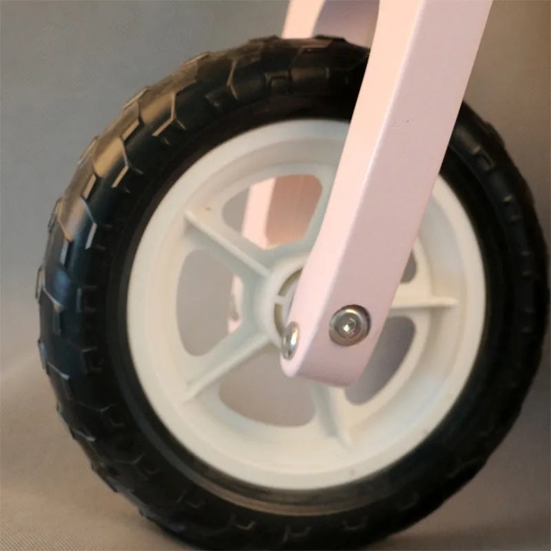 Pink wooden balance scooter for toddlers aged 1-6 years with 10-inch wheels