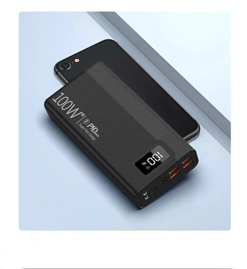 Large capacity power bank in black or white plastic shell with fast charging capability