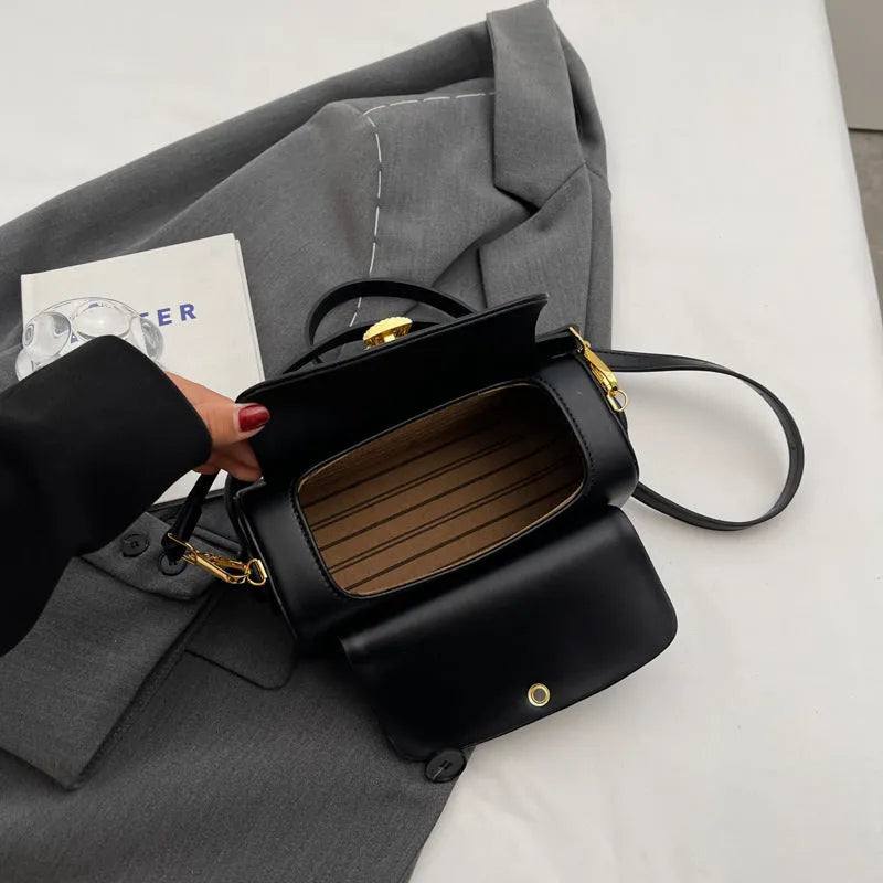 Personalised women's shoulder messenger bag in PU leather, shown in beige with a monogram letter and stitching detail.