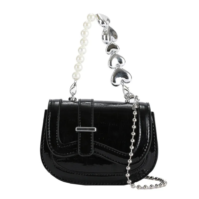 Silver PU leather women's crossbody bag with a horizontal square shape and single shoulder strap.